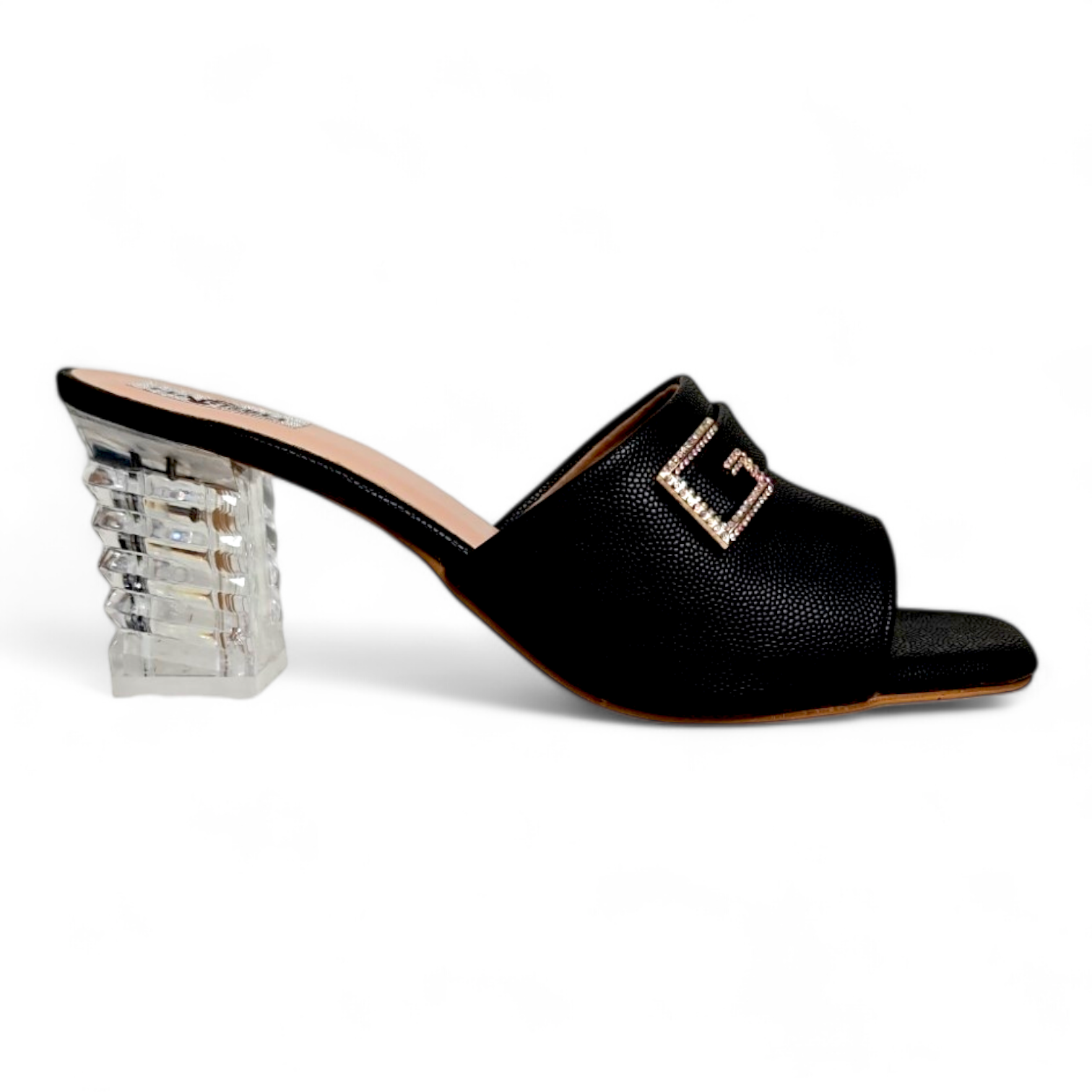 Side view of black open toe footwear with transparent heel and G embellished buckle