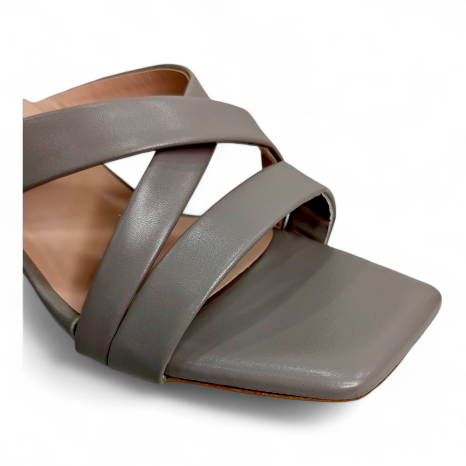 Close-up of the block heel and cross belt detail on Grey Open Toe Footwear