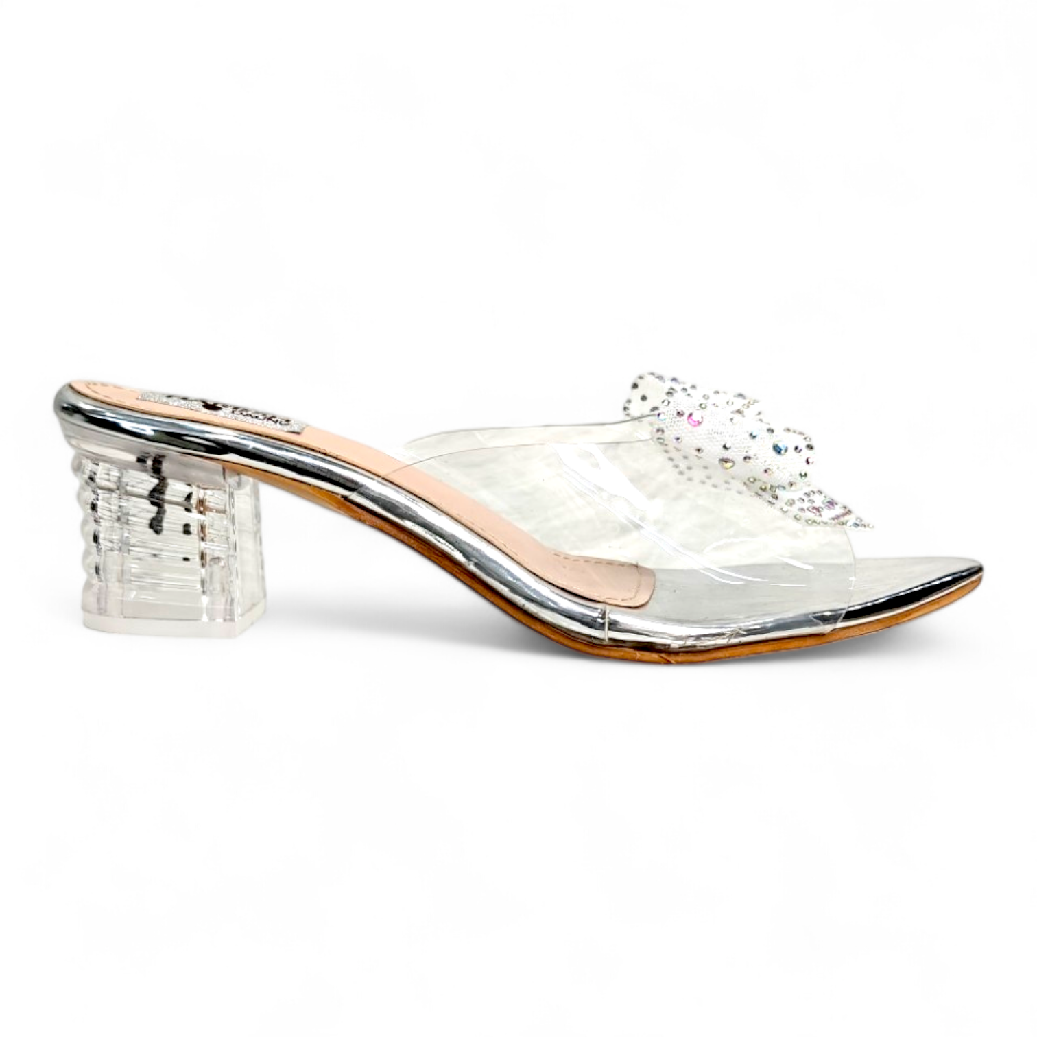 Side view of silver color footwear with transparent heel and clear belt design