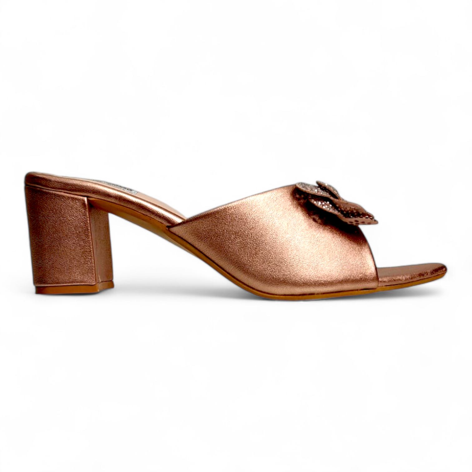 Side view of copper block heels with pointed toe and bow detail on top