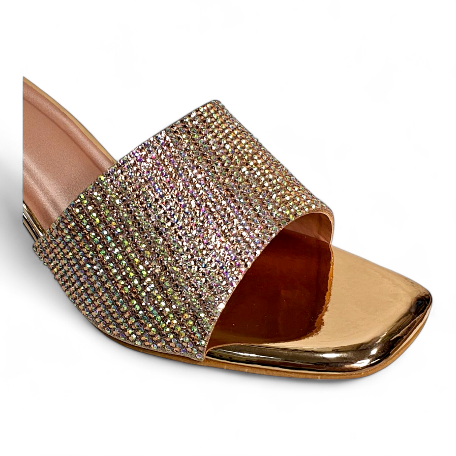 Close-up of diamond belt and rose gold block heel with open toe for formal occasions