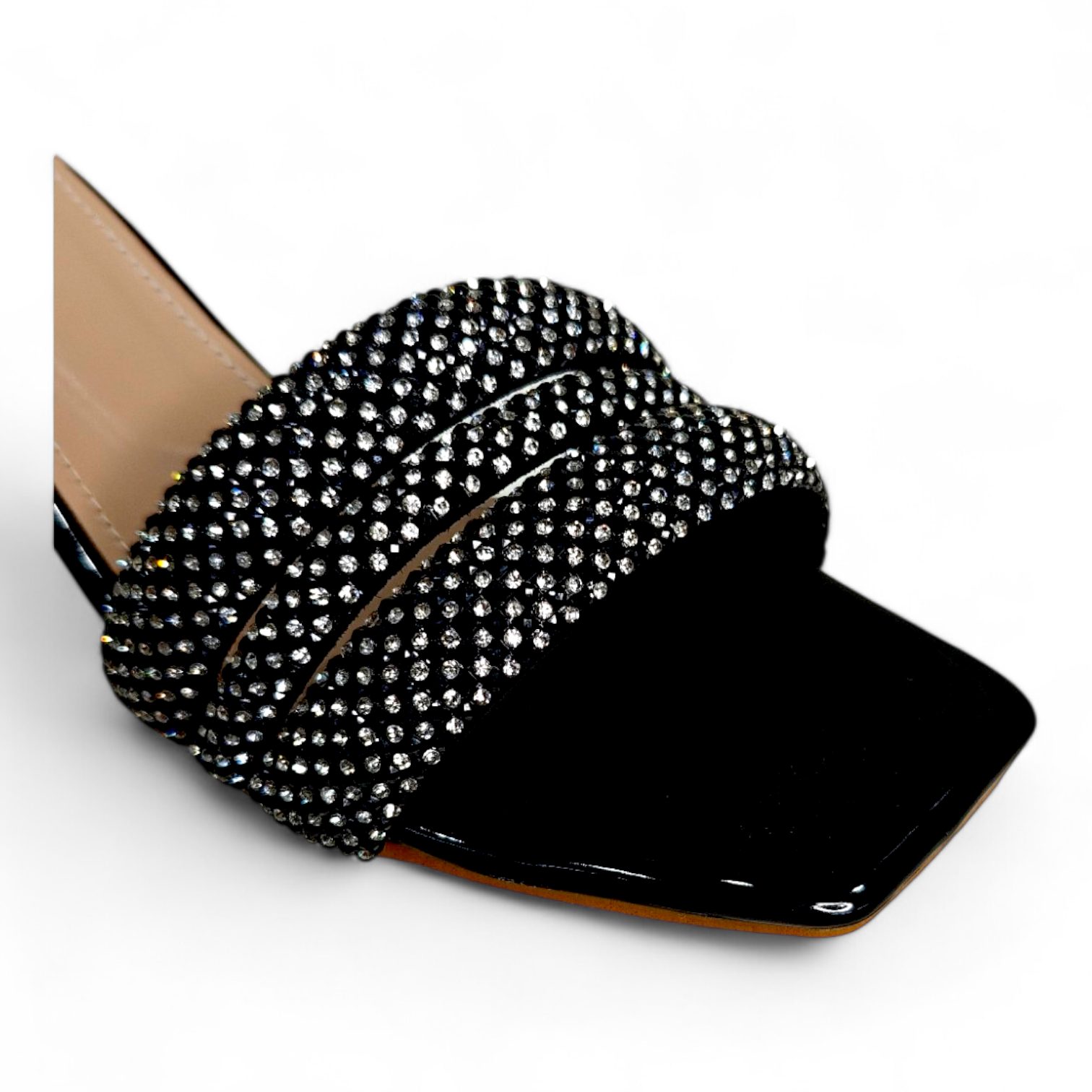 Close-up of 3 belts with diamond embellishments on black block heel open toe heels