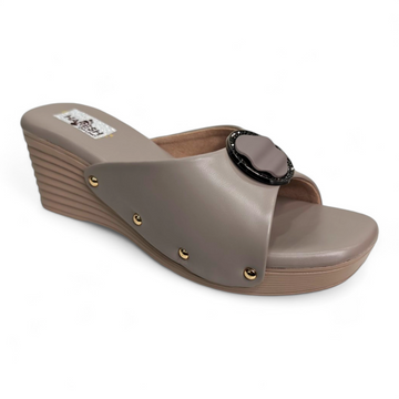 Brown wedge heel footwear with embellished circle buckle and open toe design