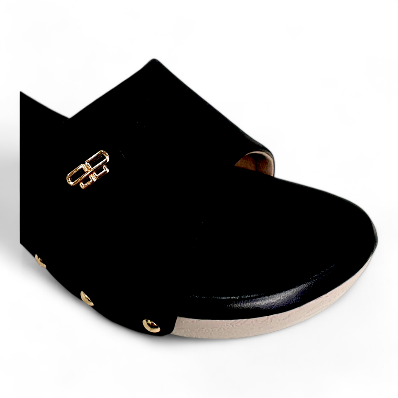 Close-up of open toe design and wedge heel in black durable footwear