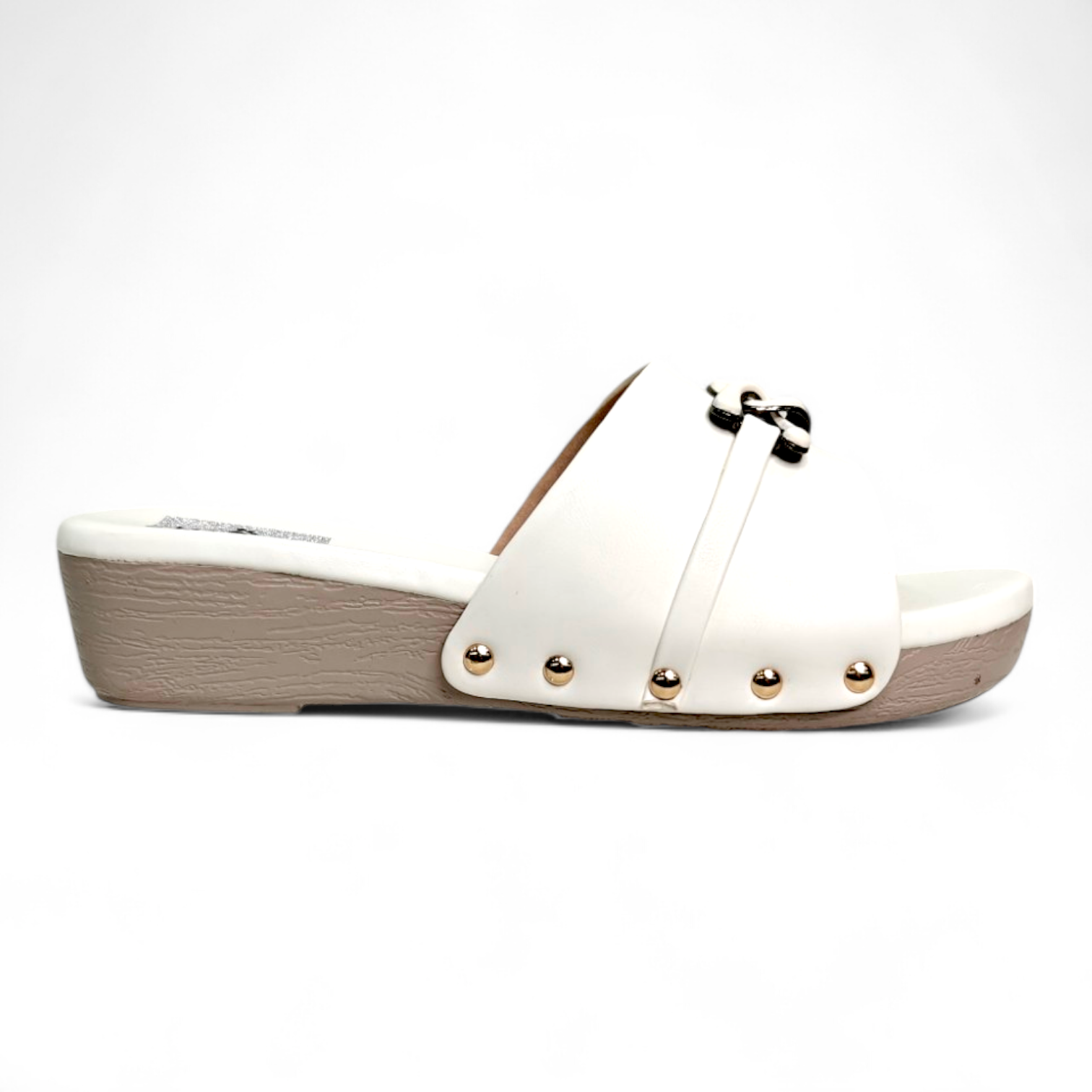 Side view of white wedge heel shoes with buckles and open toe for a comfortable fit