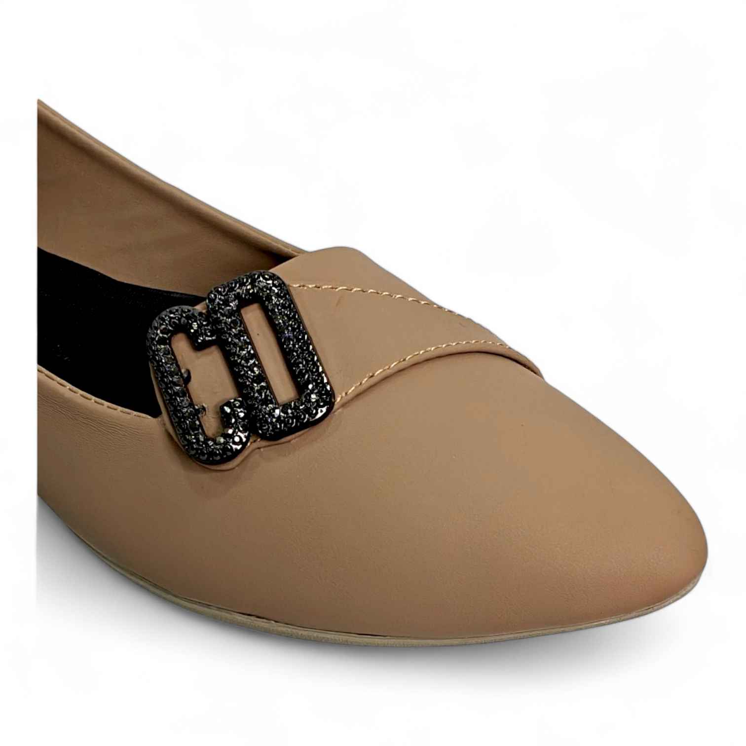 Close-up of cross knot belt and embellished detail on Women's Flat Footwear