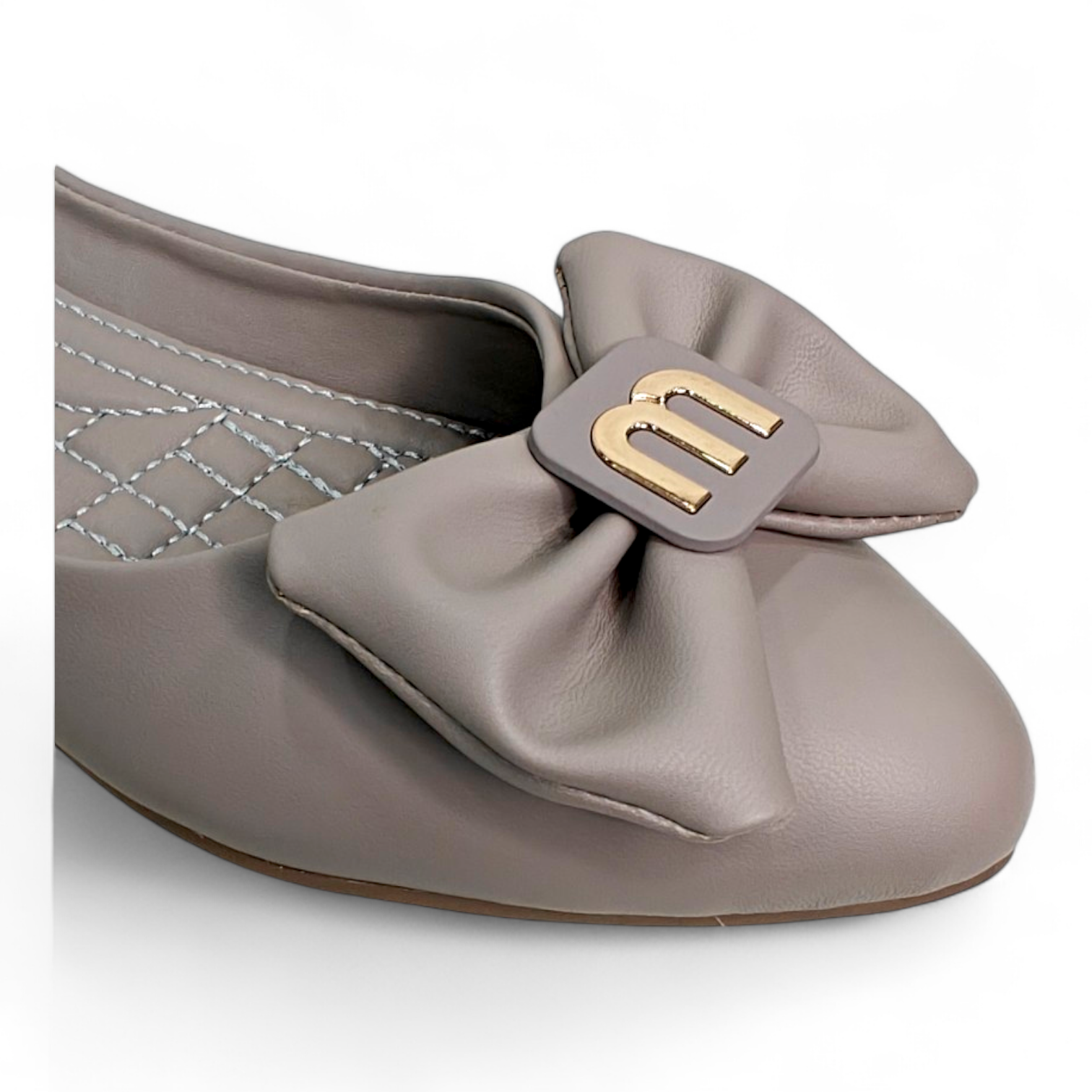 Close-up of M Buckle Bow on Grey Belly Flat Shoes, highlighting the elegant design and soft cushioned interior