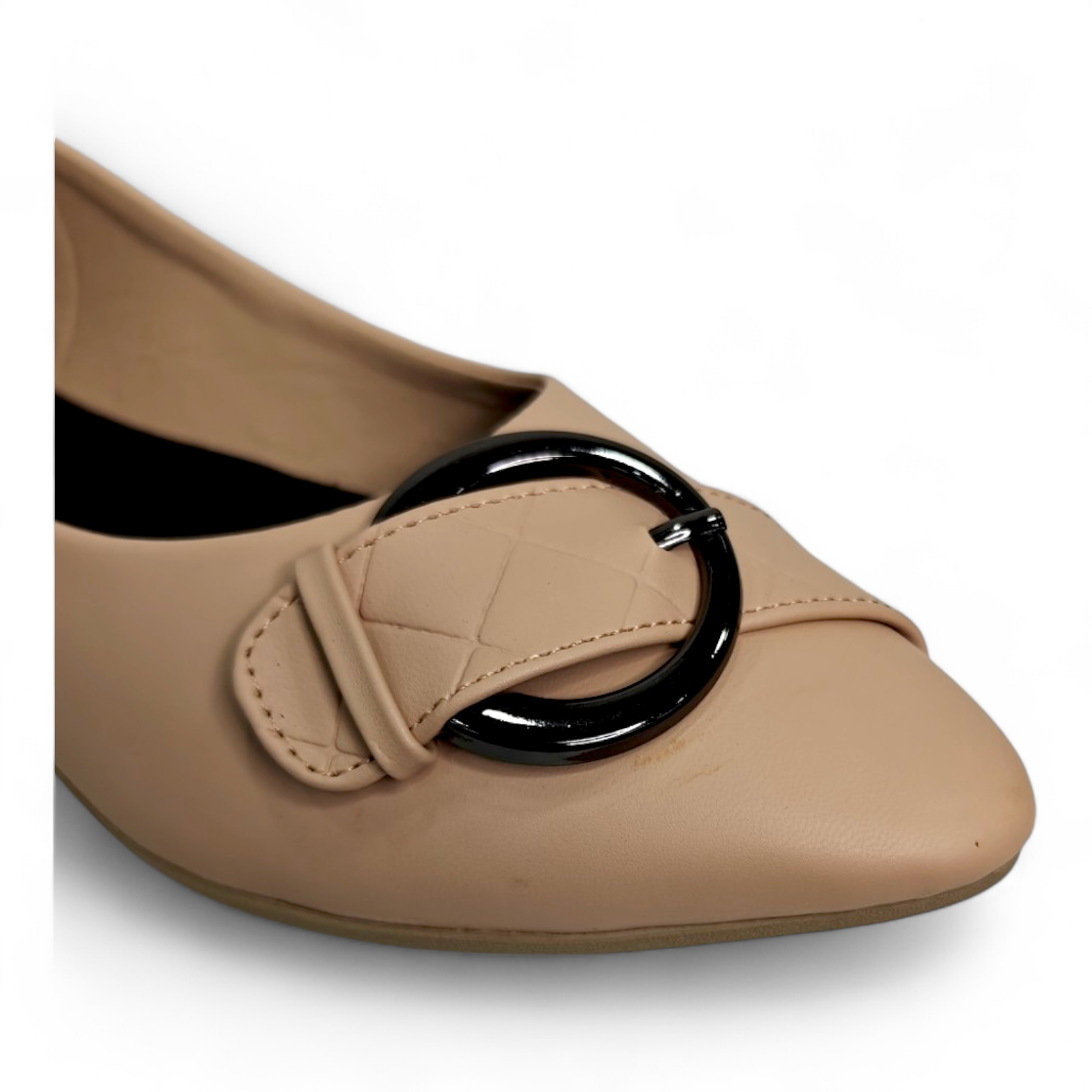 Top view of flat bellies featuring a stylish circle buckle and comfortable footbed