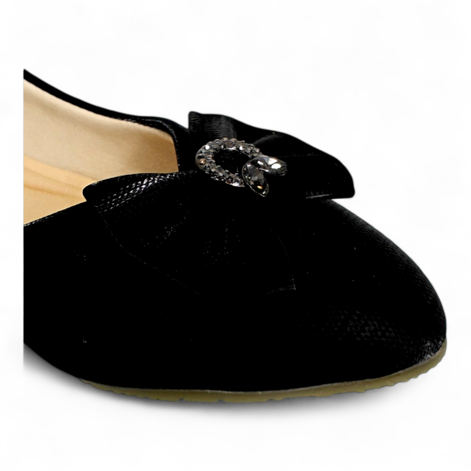 Side view of Black Flat Bellies with soft cotton material and a decorative bow