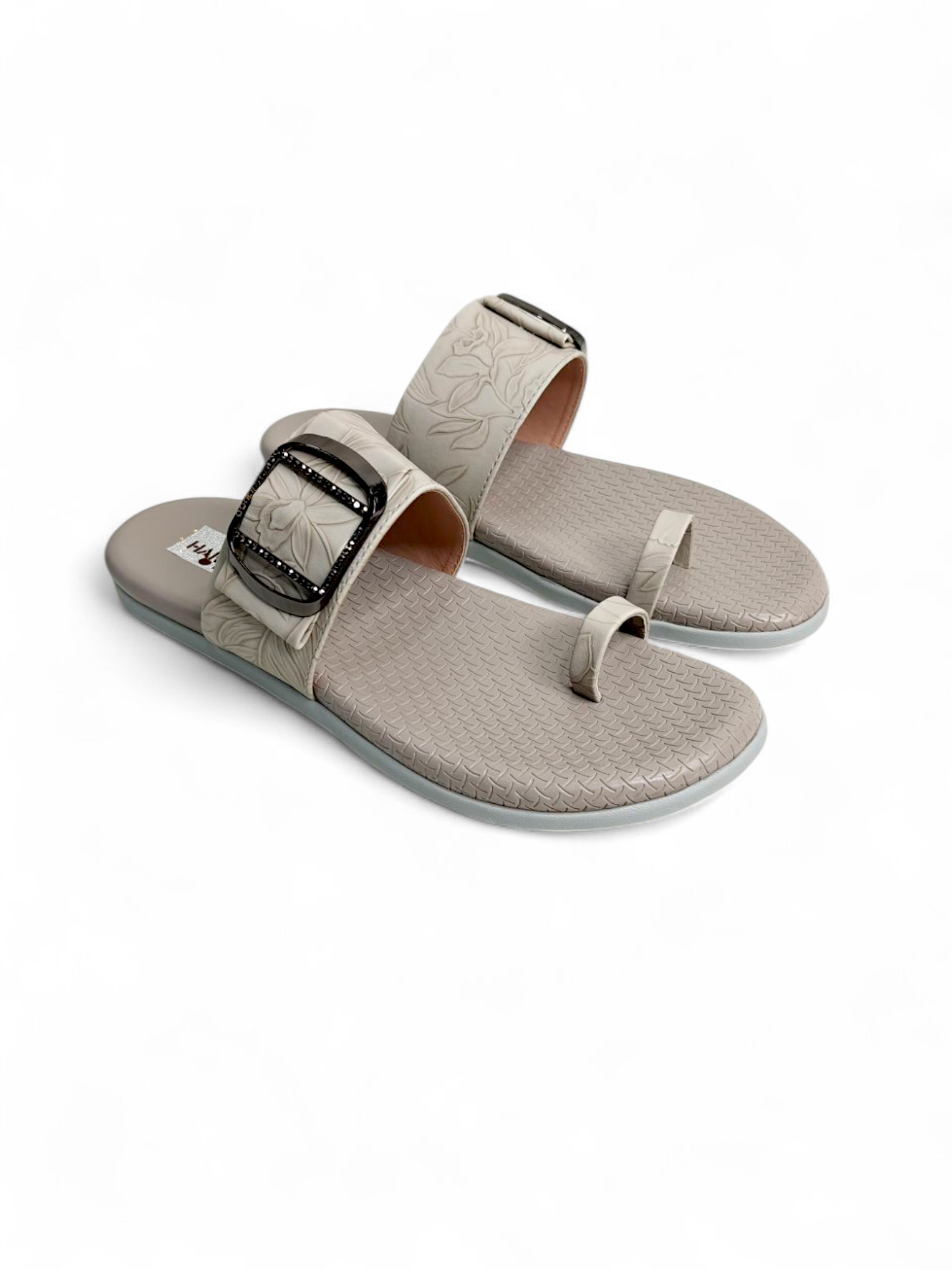 Stylish women’s beige flat slipper with toe ring