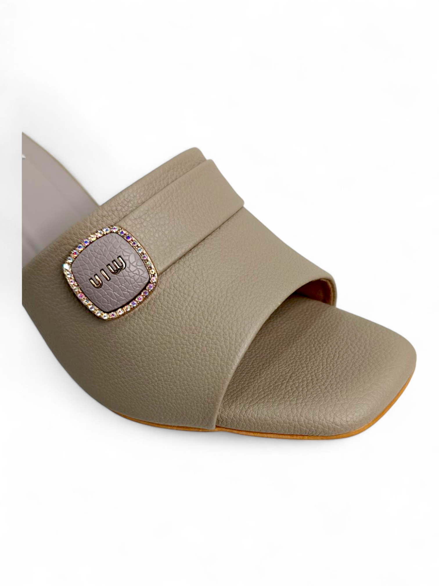 Elegant beige slip-on sandals with cushioned sole