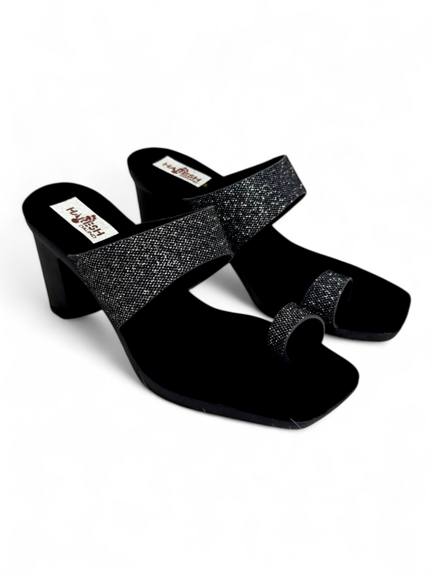 Top angle showing shimmer strap and toe-ring design on black block heels