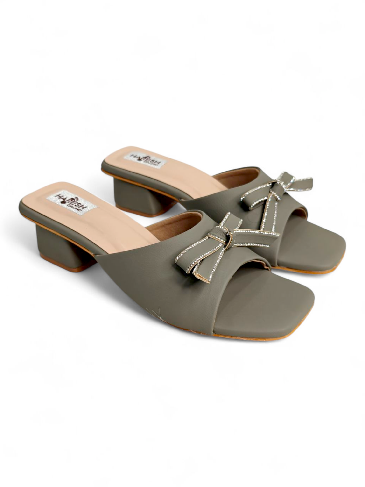 Top view showing bow detail and square toe design on olive slip-on sandals
