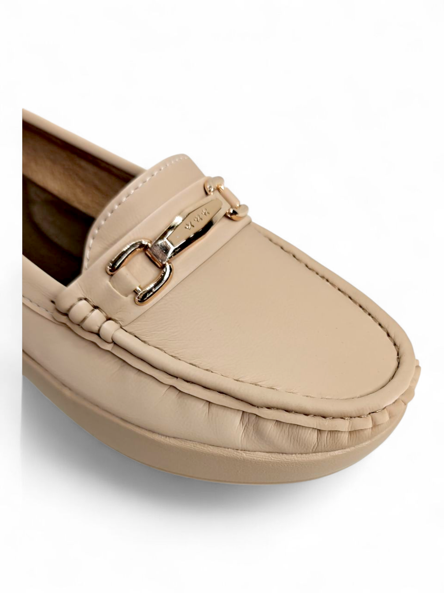 Women’s trendy beige loafers with buckle design