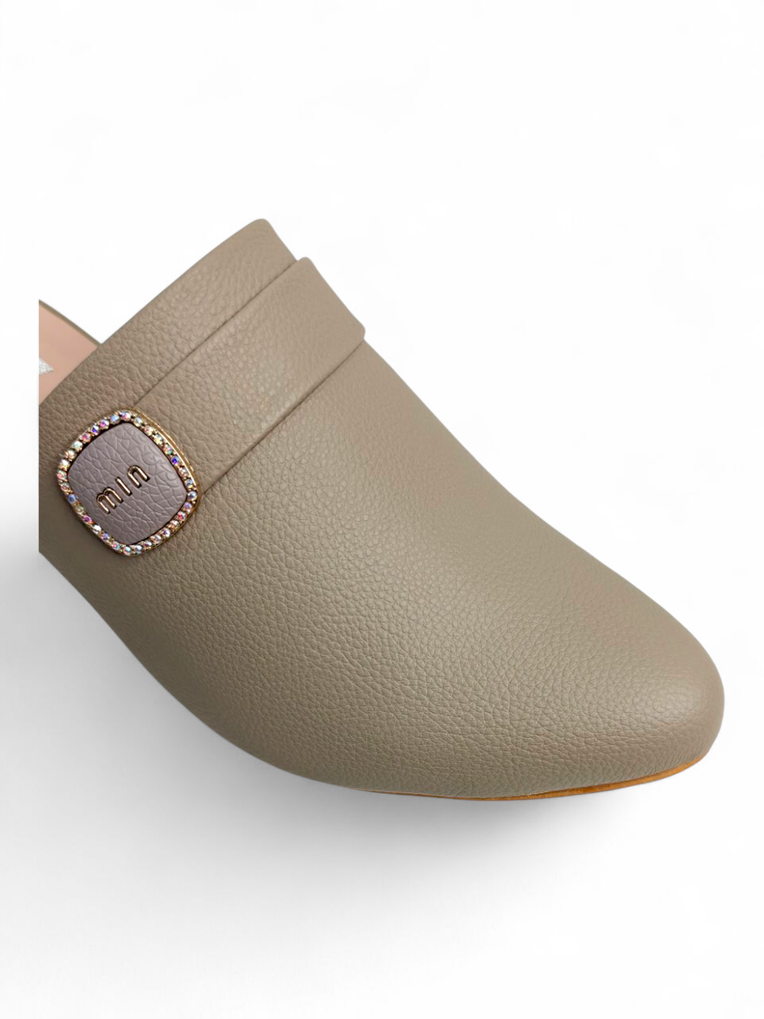 Back view of taupe women’s block heel mules with wide low heel