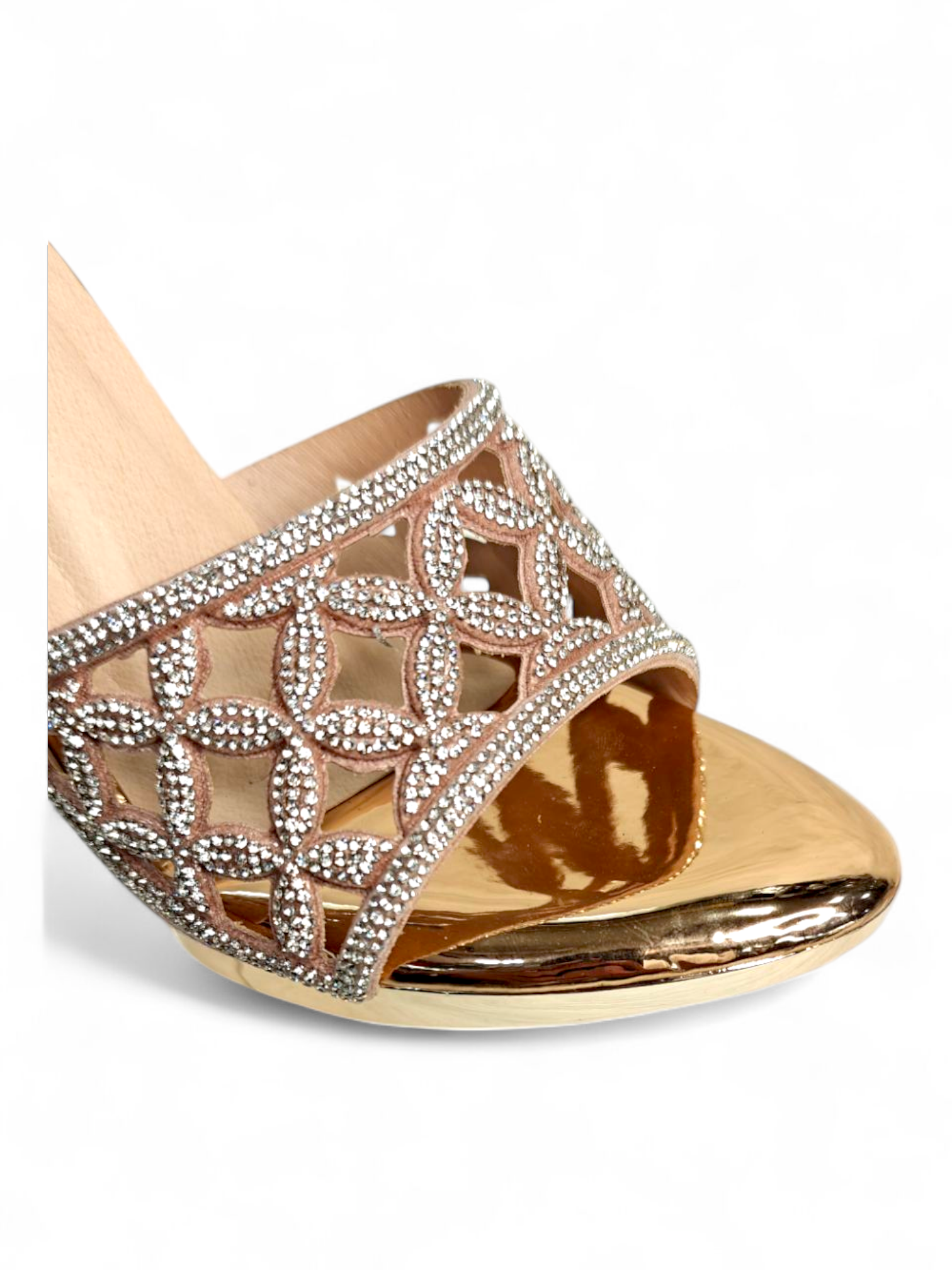 Close-up of crystal lattice strap and reflective cube heel on gold sandals