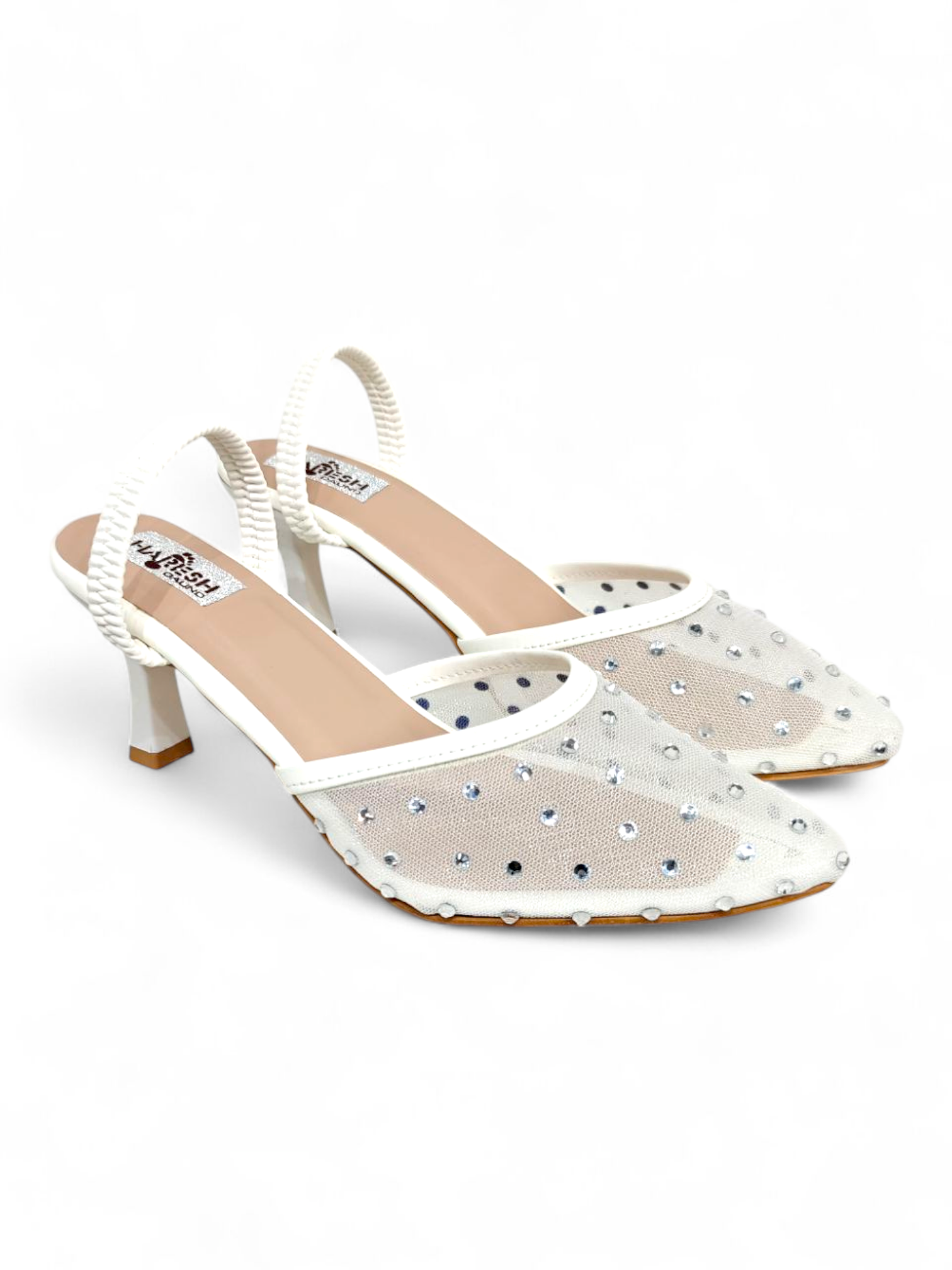 Top view showing crystal detailing on white pointed-toe mesh heels