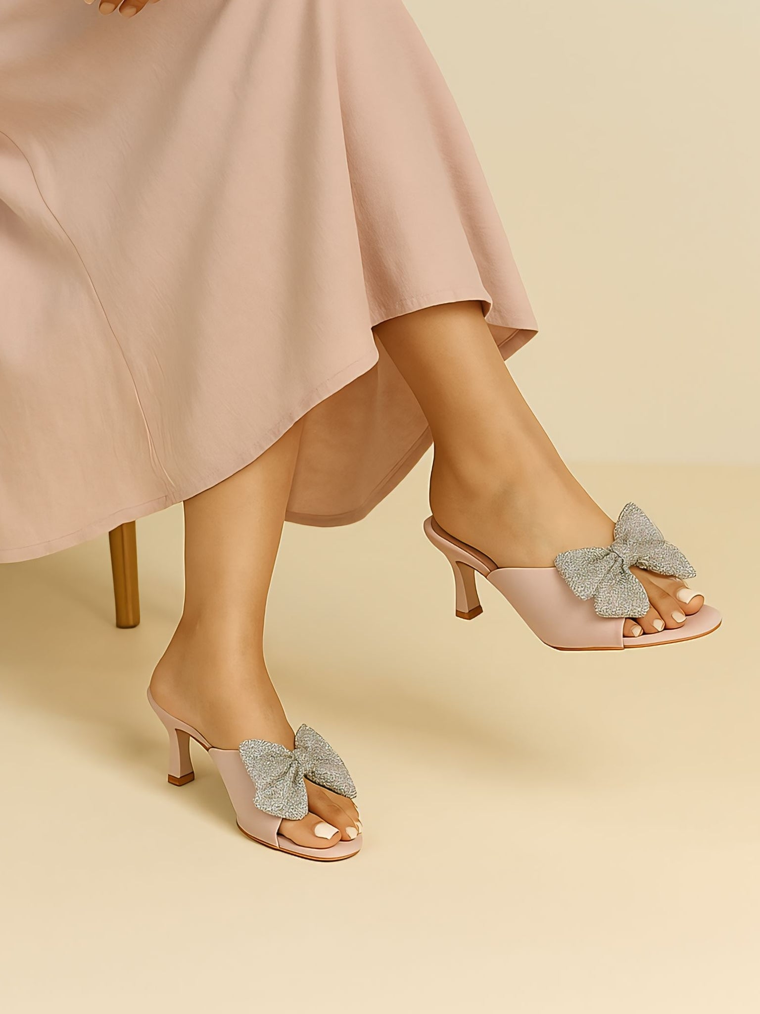 Blush pink kitten heels with crystal bow embellishment