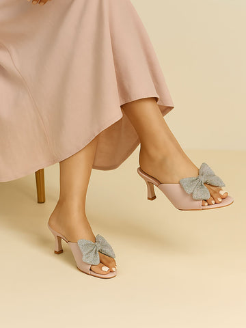 Blush pink kitten heels with crystal bow embellishment