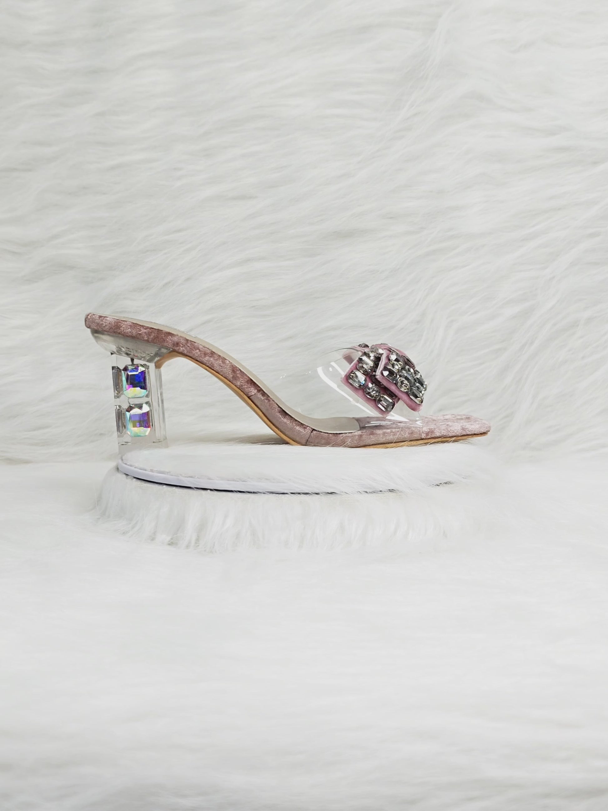 A 360° showcase of pink velvet embellished heels with crystal bow and transparent block heel — highlights cushioned insole, sparkle details, and styling with sarees and Indo-western outfits.