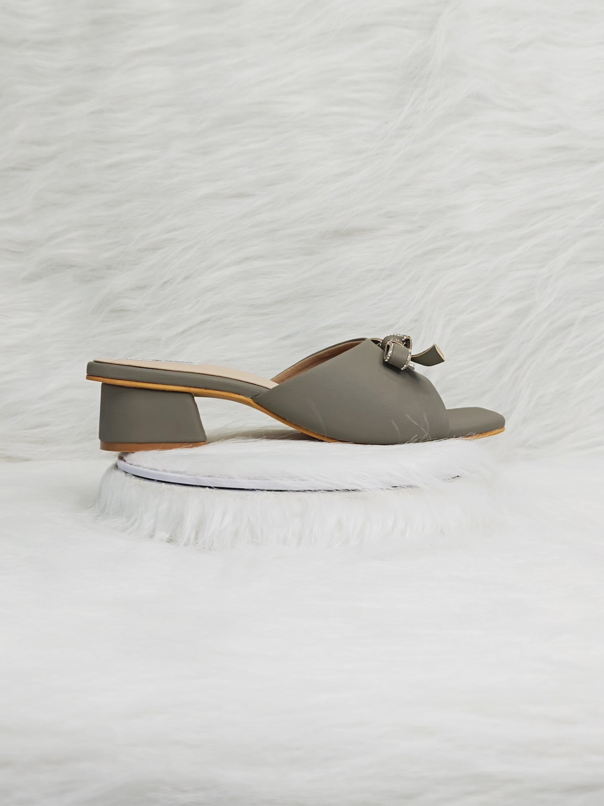 360 degree rotation of olive slip-on block heel sandals with bow detail for women