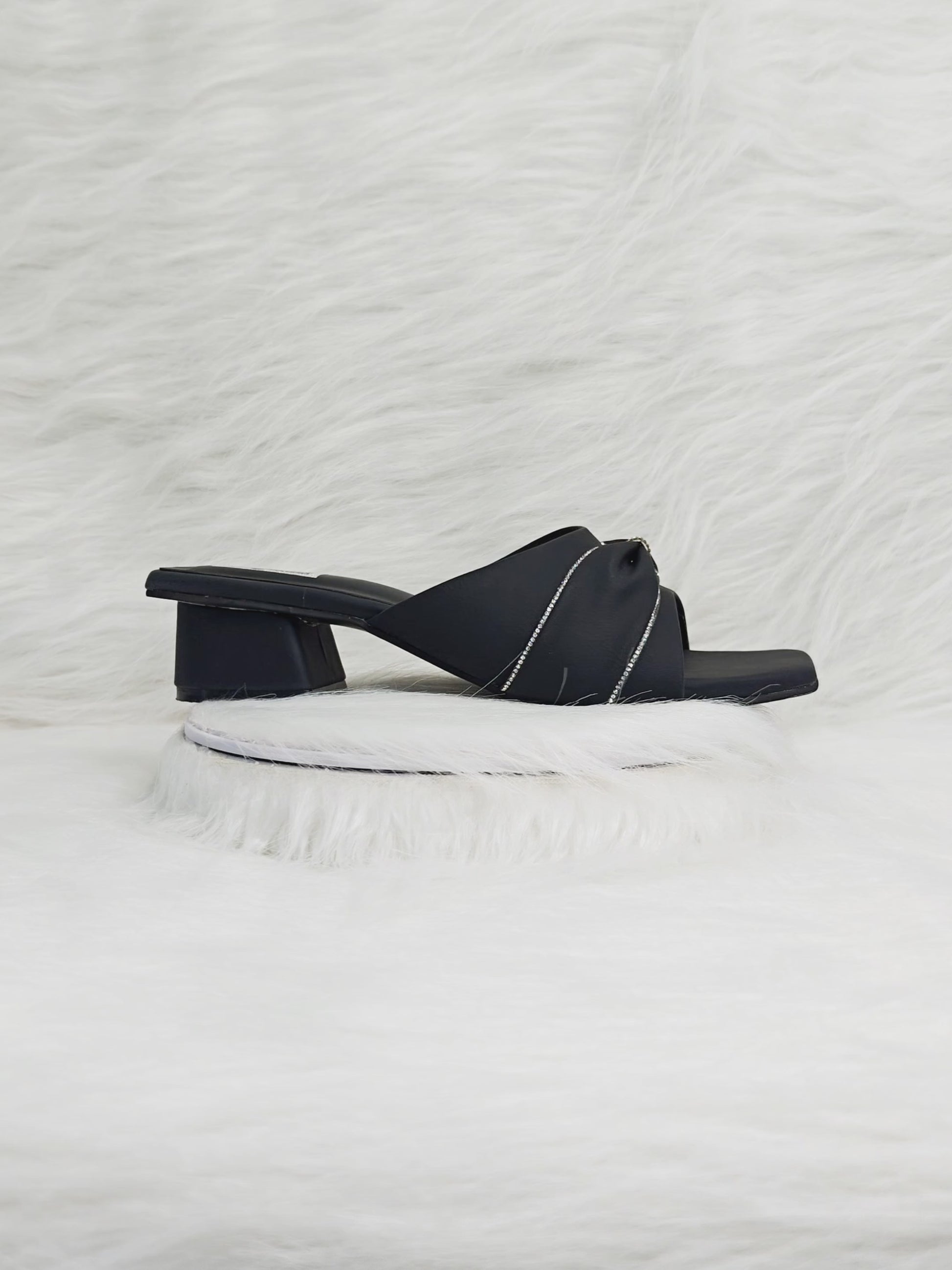 360 degree rotation of black knot-design embellished block heel sandals for women