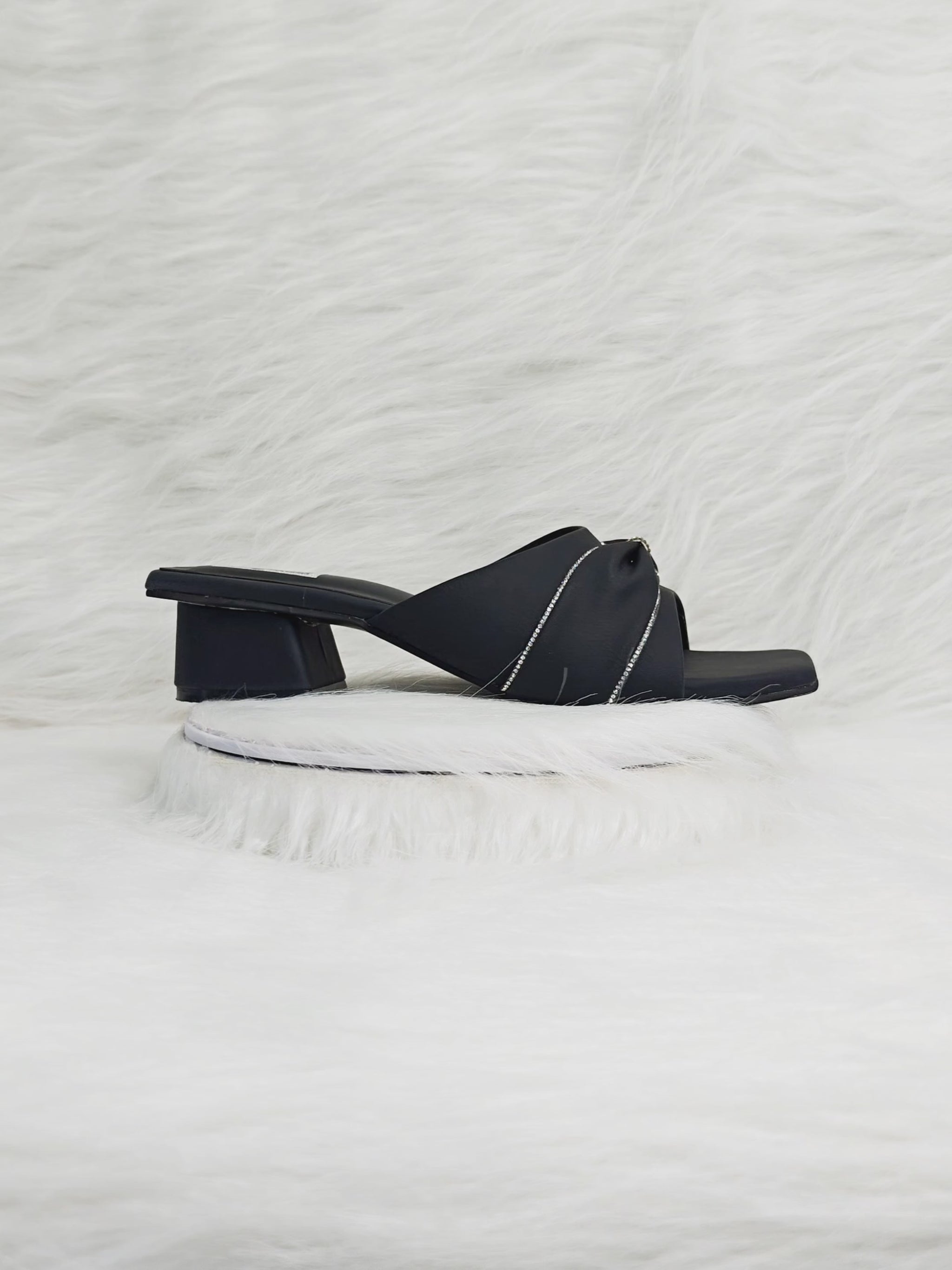 360 degree rotation of black knot-design embellished block heel sandals for women