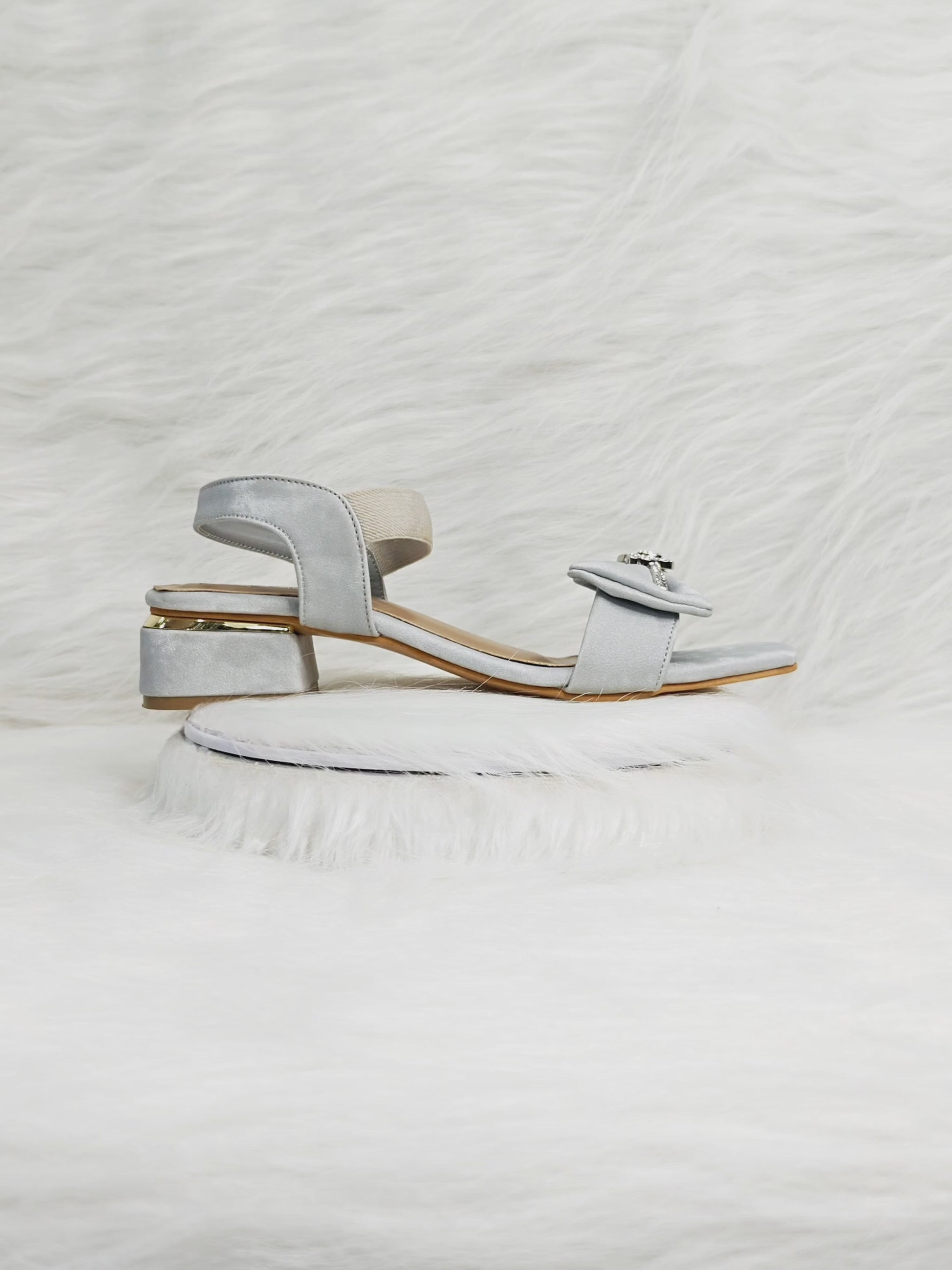 360 degree rotation of silver block heel sandals with embellished bow for women