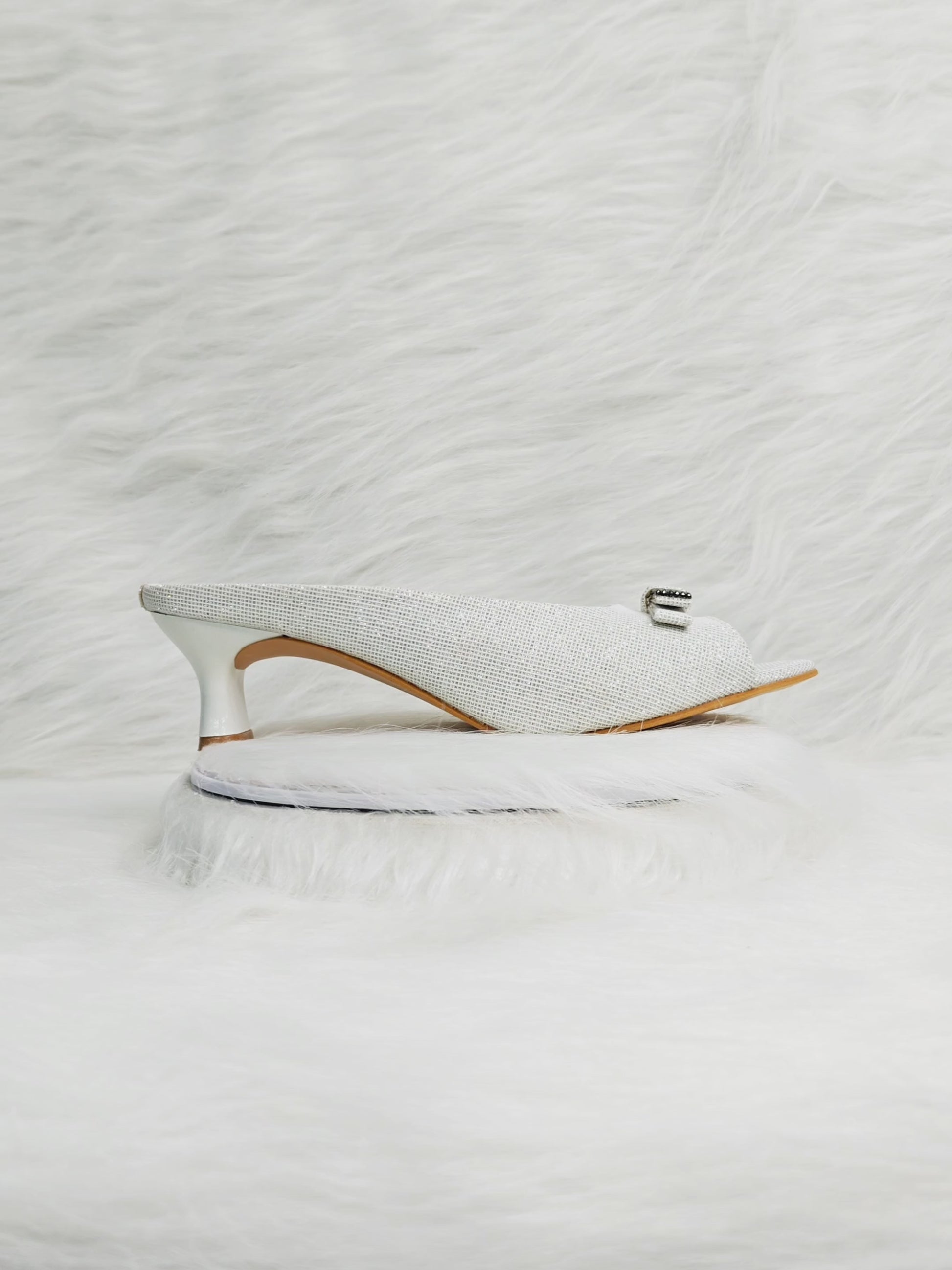 360 degree rotation of white textured peep-toe kitten heel sandals with buckle for women