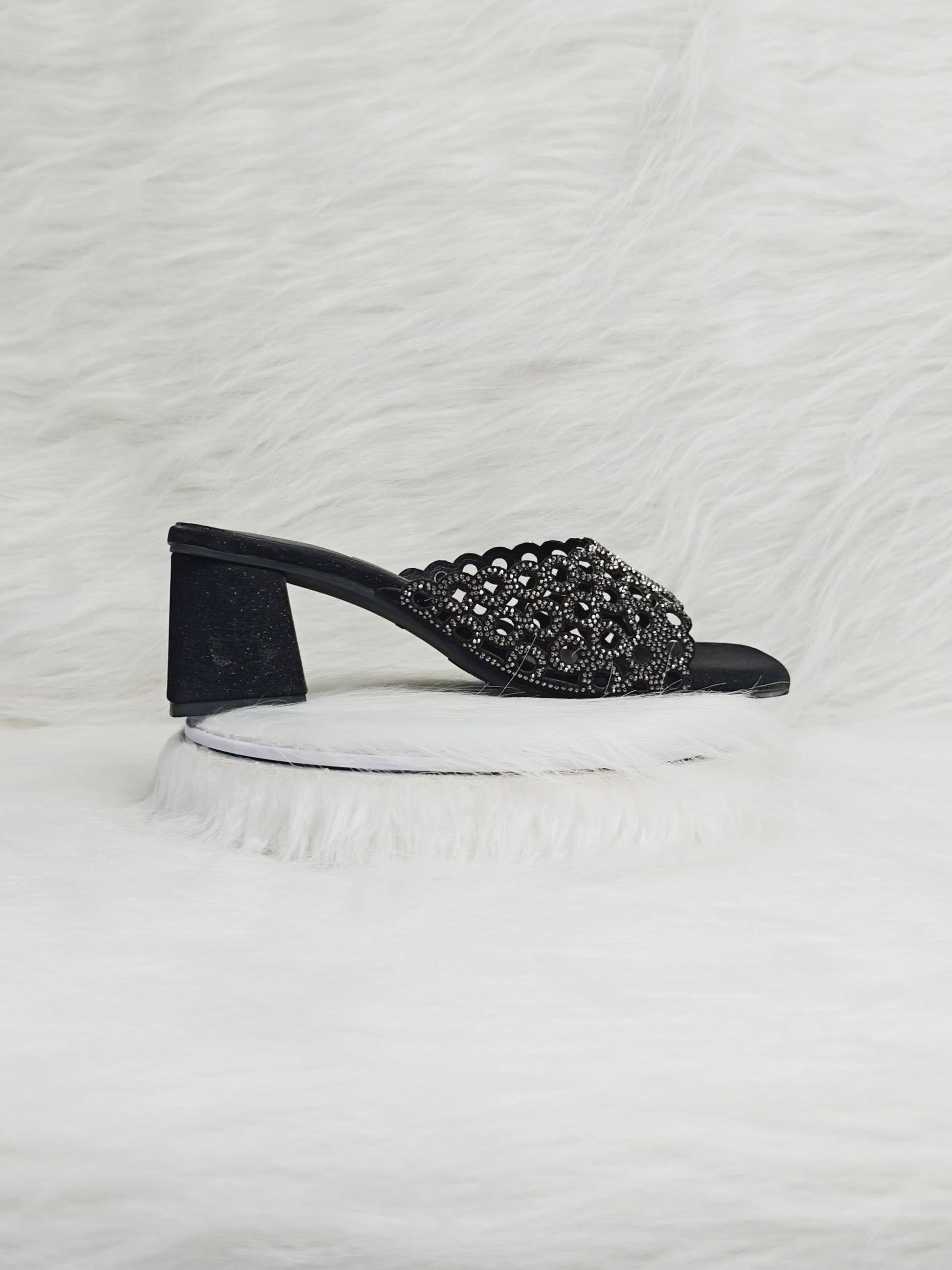 360 degree rotation of black stone embellished cutwork block heel sandals for women