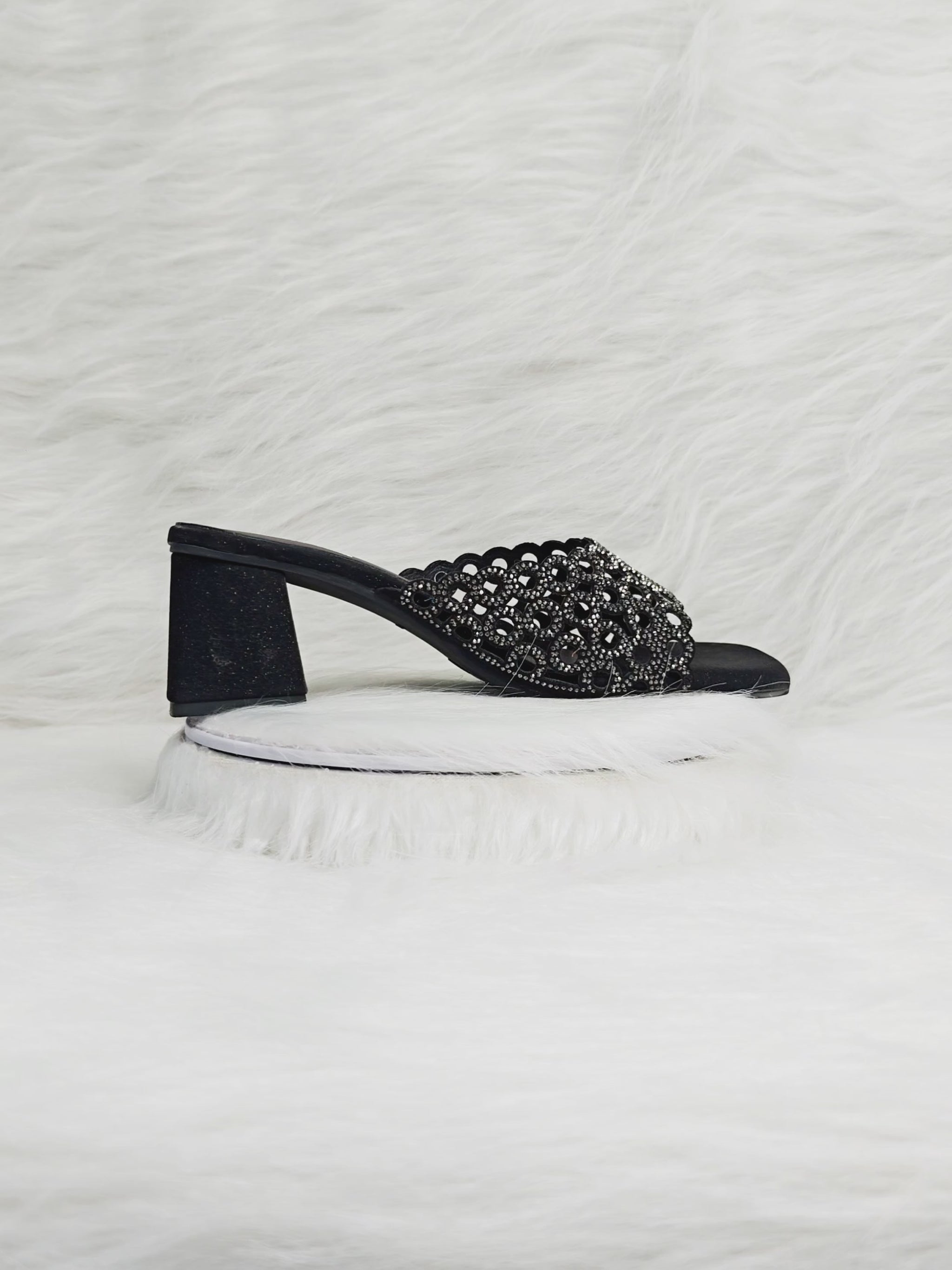 360 degree rotation of black stone embellished cutwork block heel sandals for women